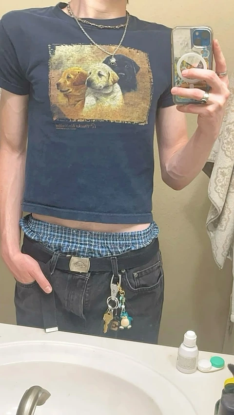 A man taking a picture of himself in a mirror.