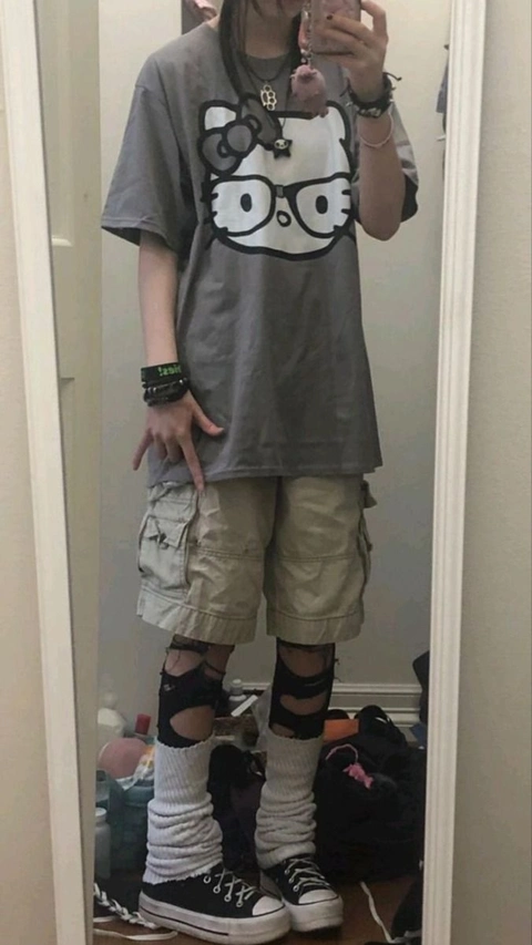 A man taking a picture of himself in a mirror.