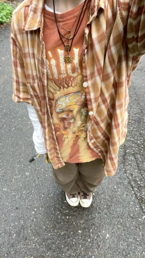 a mannequin wearing a shirt with a picture of a man on it