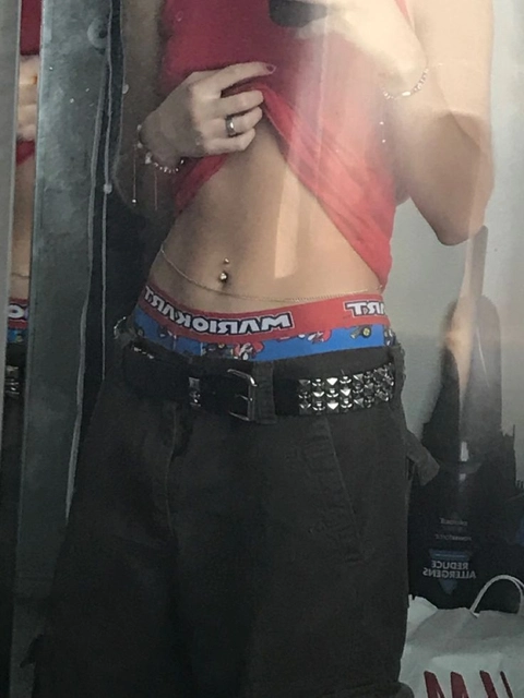 A reflection of a woman in a mirror.