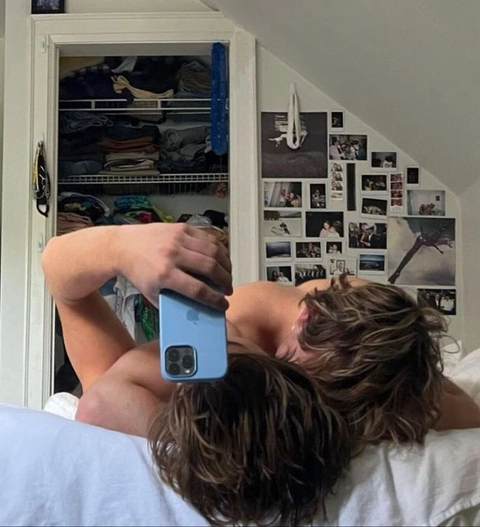 A man taking a picture of himself in a mirror.