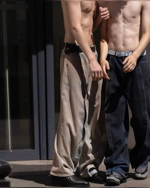 A group of naked men standing next to each other.