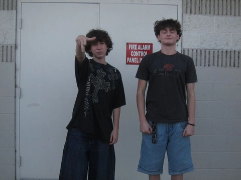 A group of young men standing next to each other.